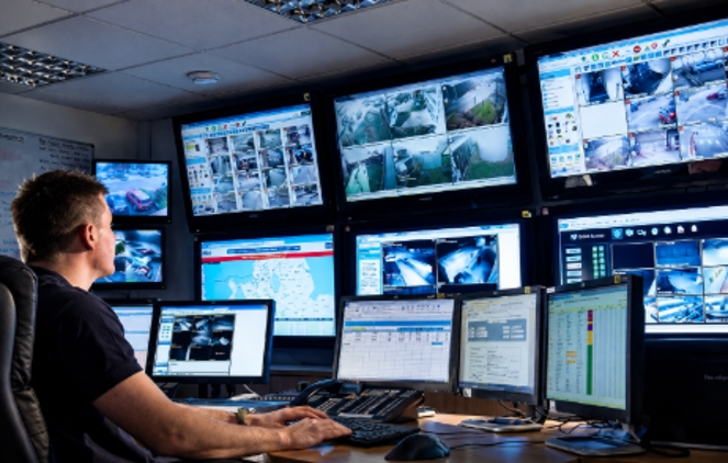 Operator monitoring multiple security camera feeds
